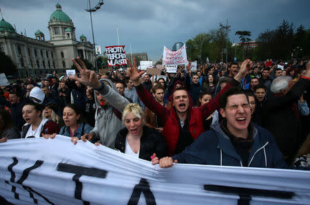 Protesters take part in a demonstration against the overwhelming victory of Prime Minister Aleksandar Vucic in Serbia's presidential election in Belgrade, Serbia April 5, 2017. REUTERS/Djordje Kojadinovic