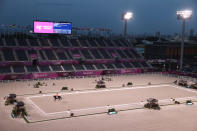 <p>TOKYO, JAPAN - JULY 28: Hans Peter Minderhoud of Team Netherlands riding Dream Boy competes in front of empty stands in the Dressage Individual Grand Prix Freestyle Final on day five of the Tokyo 2020 Olympic Games at Equestrian Park on July 28, 2021 in Tokyo, Japan. (Photo by Julian Finney/Getty Images)</p> 