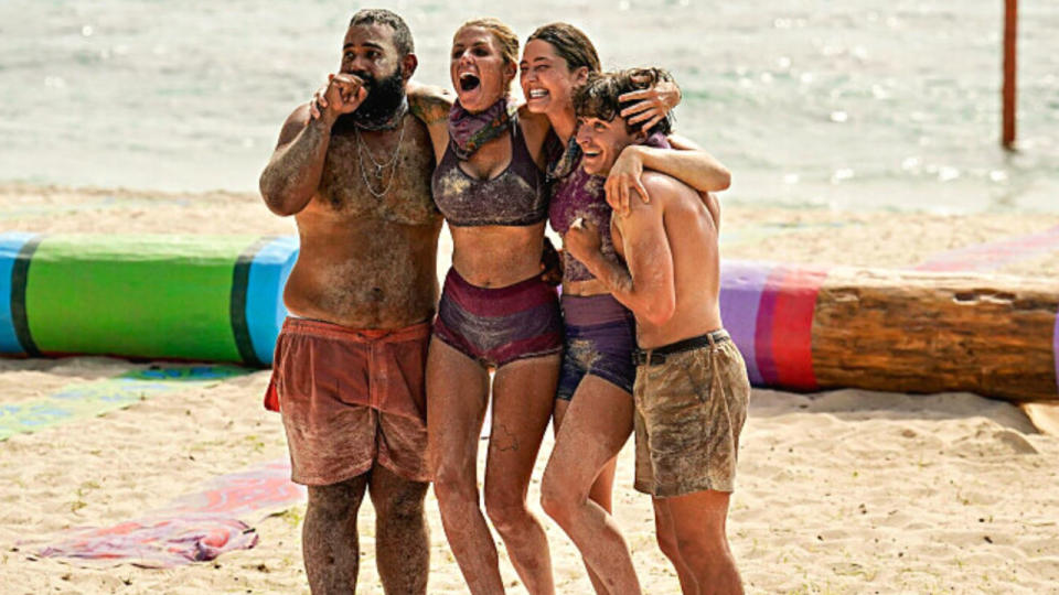  Sarah, Carolyn, Yam Yam and Carson celebrate a challenge win on Survivor 44. 