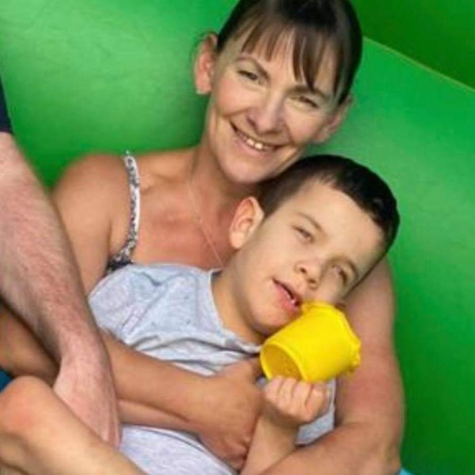 Emma Sutton with her 7-year-old son Oscar, who suffers from seizures and benefits from Mr Bailey’s cannabis oil (Supplied)