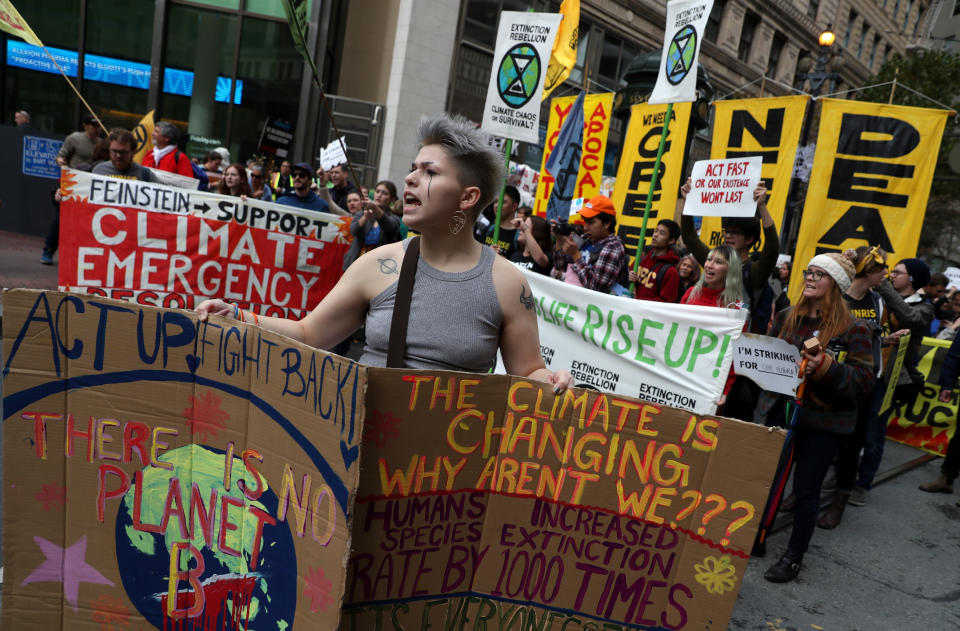 SAN FRANCISCO, CALIFORNIA- DECEMBER 06: Protesters march along Market Street during a youth climate strike on December 06, 2019 in San Francisco, California. Hundreds of youth climate activists staged a demonstration outside of the BlackRock offices in San Francisco as part of a nationwide youth climate strike to coincide with the United Nations climate summit being held in Madrid, Spain (Photo by Justin Sullivan/Getty Images)