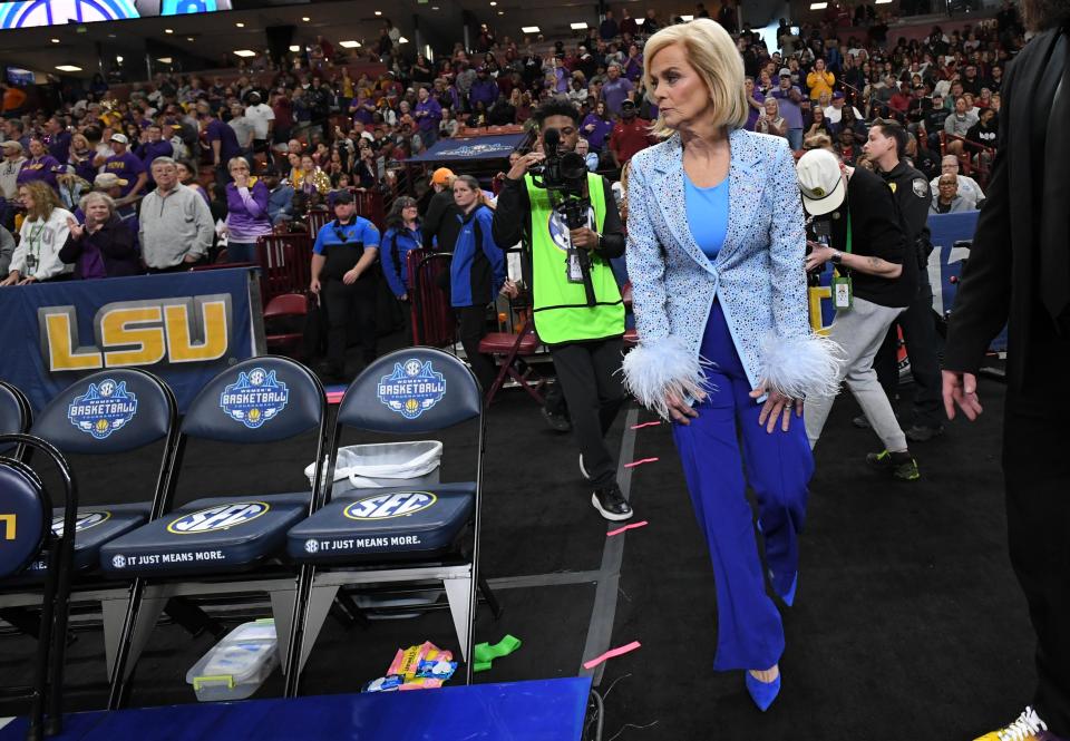 Louisiana State University Coach Kim Mulkey walks on the court before tip off with South Carolina Gamecocks in the SEC Women's Basketball Tournament Championship game at the Bon Secours Wellness Arena in Greenville, S.C. Sunday, March 10, 2024.