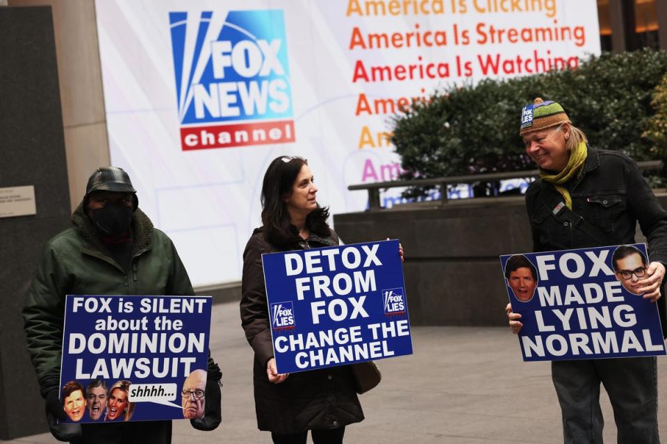 Protesters demonstrate outside News Corp headquarters in New York City on 21 February. (Getty Images)
