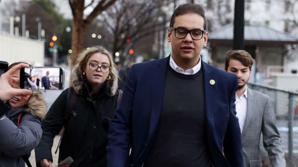 PHOTO: Rep. George Santos leaves the Capitol Hill Club as members of the press follow him on Jan. 31, 2023 in Washington, DC. (Alex Wong/Getty Images)