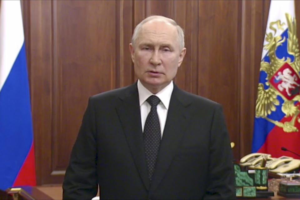 In this handout photo taken from video released by Russian Presidential Press Service, Russian President Vladimir Putin addresses the nation in Moscow, Russia, Saturday, June 24, 2023. (Russian Presidential Press Service via AP)