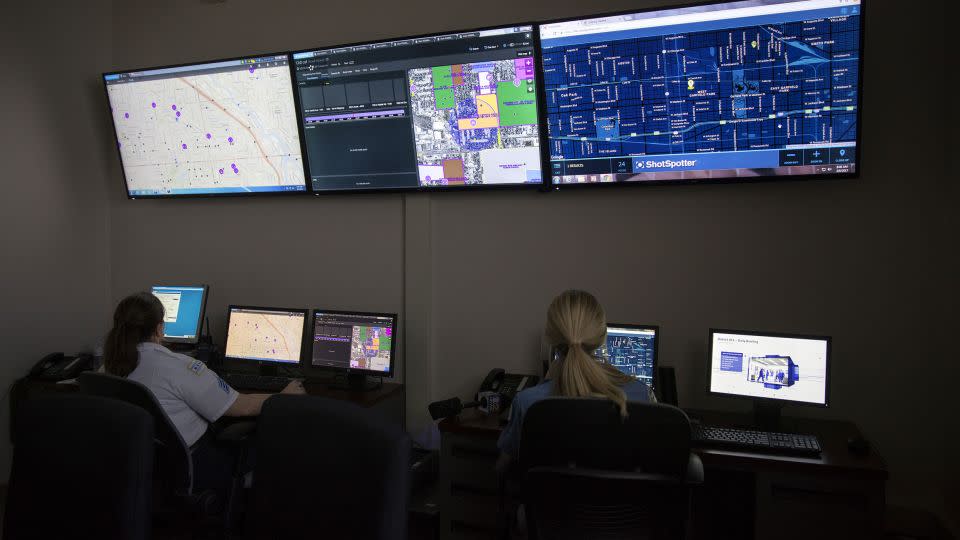 Chicago Police Department members work with predictive and tracking technologies, including ShotSpotter, at the department's 11th District headquarters in 2017. - Erin Hooley/Chicago Tribune/TNS/Zuma