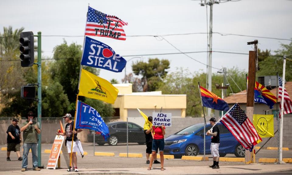 Protesters supporting Trump gather outside the Veterans Memorial Coliseum in Phoenix on 1 May.