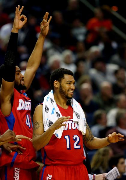 Jalen Robinson (R) and Devon Scott during a Dayton victory during the NCAA tournament. (Getty)