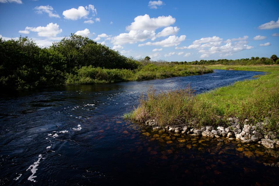 Water flows through a structure that is part of the The Lake Hicpochee Storage and Hydrologic Enhancement Project built by the South Florida Water Management District near Moore Haven on Wednesday, Oct. 25, 2023.