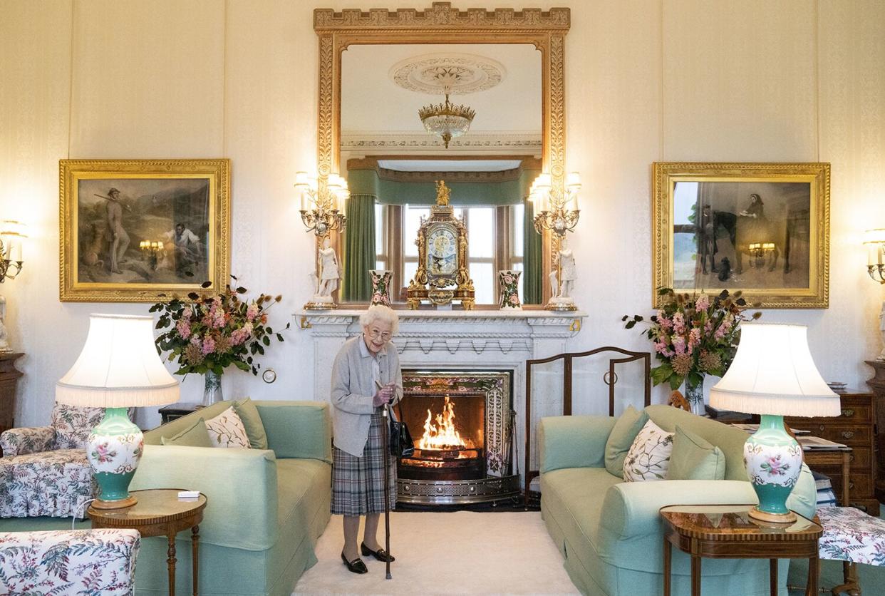 Queen Elizabeth II waits in the Drawing Room before receiving newly elected leader of the Conservative party Liz Truss at Balmoral Castle