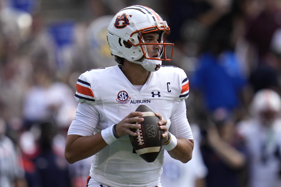 Auburn quarterback Payton Thorne (1) looks to pass down field against Texas A&M during the first quarter of an NCAA college football game Saturday, Sept. 23, 2023, in College Station, Texas. (AP Photo/Sam Craft)