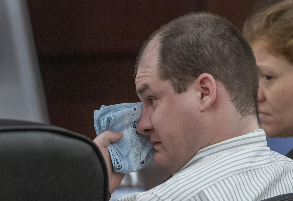 Timothy Jones Jr., charged with killing his five children, wipes his eyes during his trial in Lexington, S.C., Wednesday, May 22, 2019. Lawyers defending Jones turned Wednesday to brain science in an effort to spare their client from the death penalty. (Tracy Glantz/The State via AP, Pool)