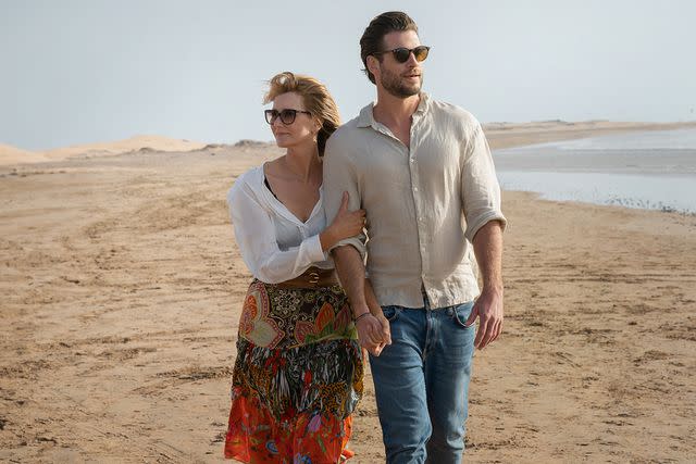 <p>Hilary Bronwyn Gayle/Netflix</p> Laura Dern and Liam Hemsworth in <em>Lonely Planet</em> (2024)