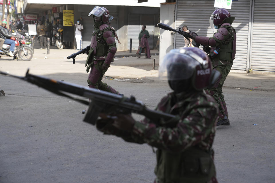 Kenya anti-riot police fire tear gas canisters at protesters in downtown Nairobi, Kenya Tuesday, July 2, 2024. Protests have continued to rock several towns in Kenya including the capital Nairobi, despite the president saying he will not sign a controversial finance bill that sparked deadly protests last week. (AP Photo/Brian Inganga)