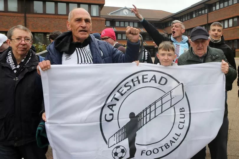 Gateshead FC fans protest outside Gateshead Civic Centre.