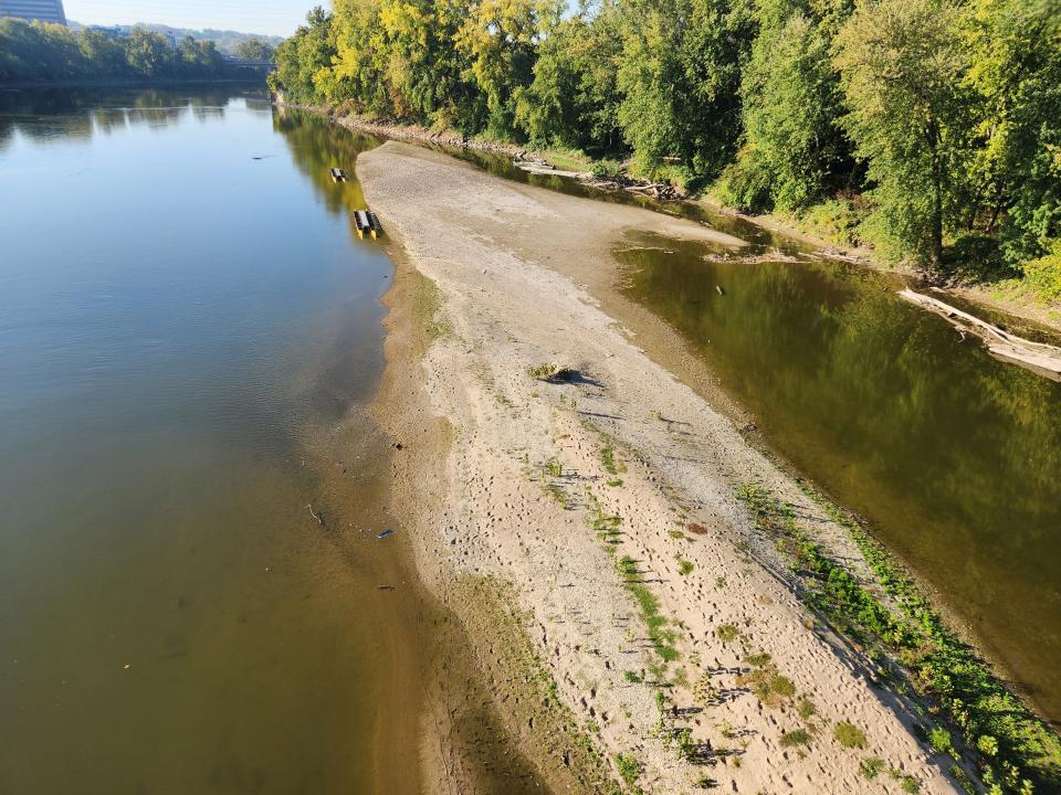 The banks of the Wabash River, a view captured Oct. 2, 2023, from the Harrison Bridge between West Lafayette and Lafayette, draw in during drier months. An economic development project in Lebanon, Ind., hopes to pull as much as 100 million gallons of water a day from Tippecanoe County resources, including the Wabash River.