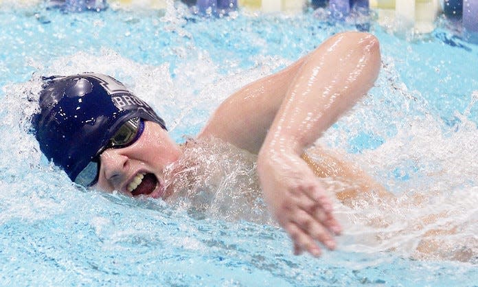 Bartlesville High's Travis Lief surges through the Adams Pool water during a home meet on Jan. 3, 2023.