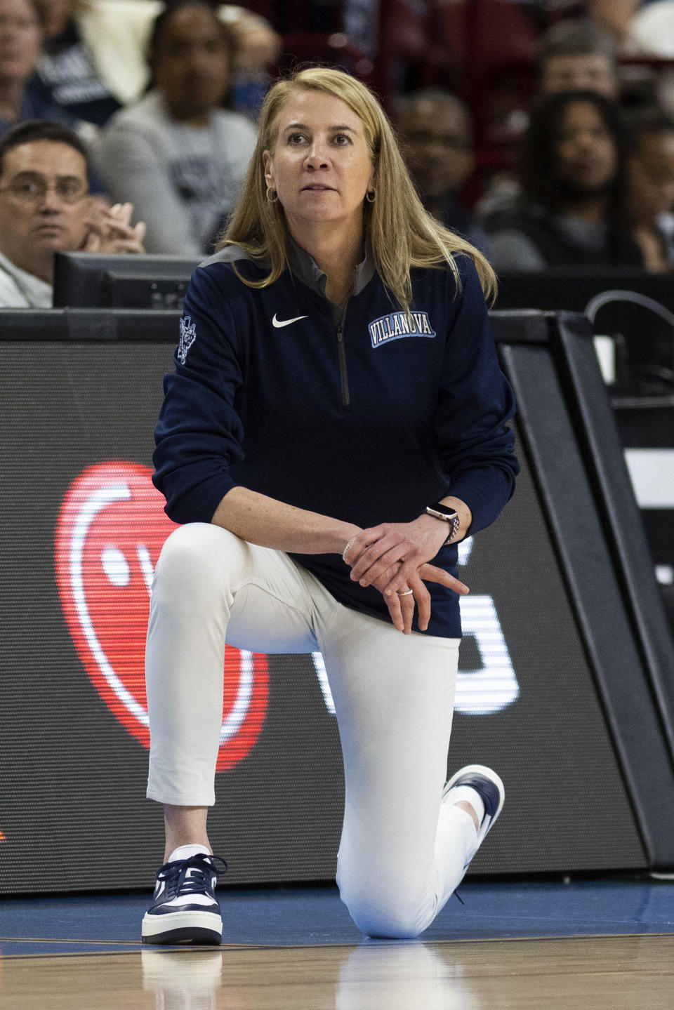 Villanova's head coach Denise Dillon watches the offense during the second half of a Sweet 16 college basketball game against Miami in the NCAA Tournament in Greenville, S.C., Friday, March 24, 2023. (AP Photo/Mic Smith)