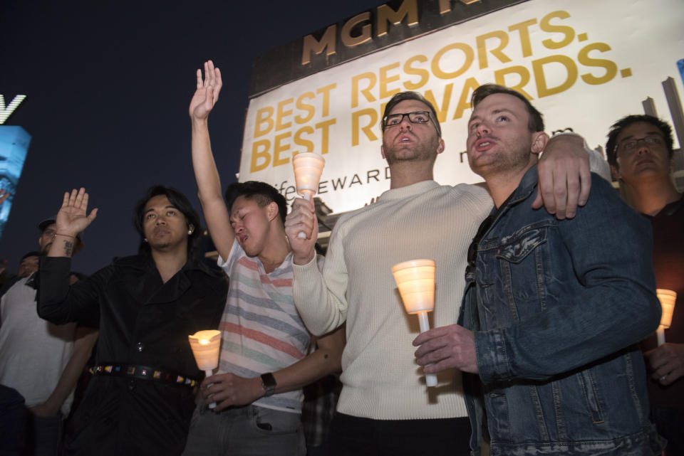 Mourners show support during a candlelight vigil. (Photo: Martin S. Fuentes for HuffPost)