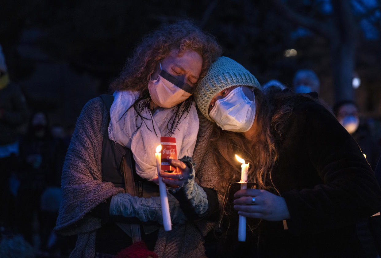 Boulder residents attend a candle light vigil honoring the 10 people who were killed on March 24, 2021 in Boulder, Colorado. (Paula Bronstein./Getty Images)