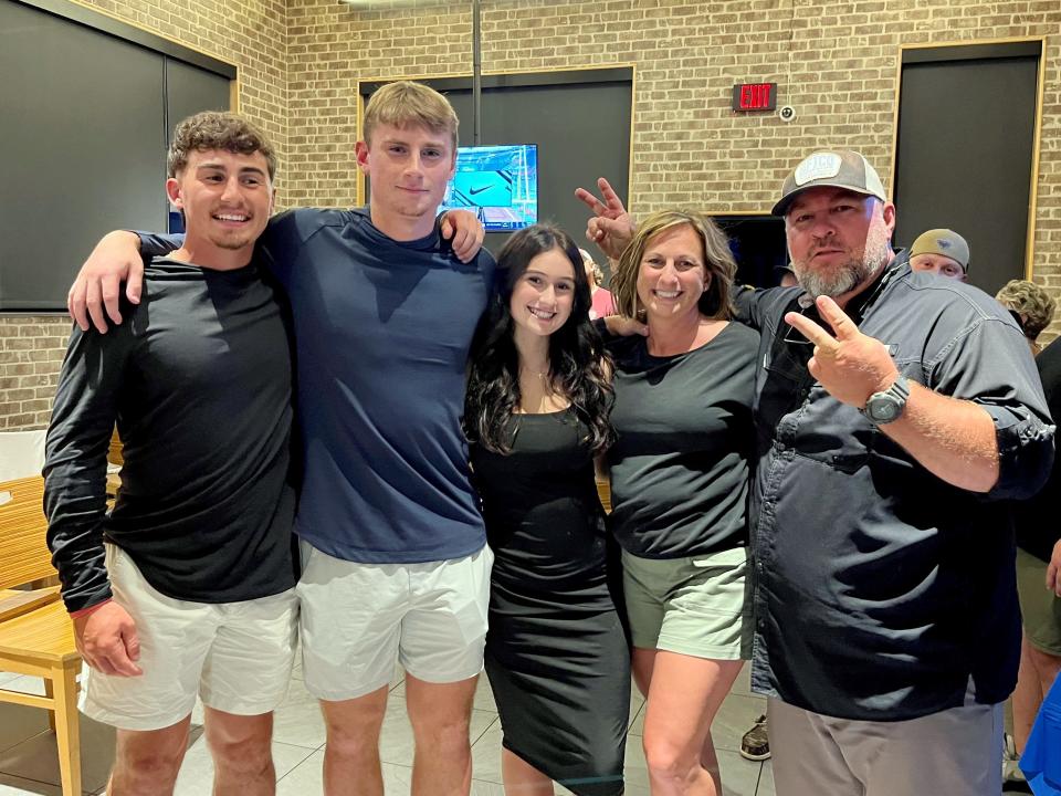John Glenn High School graduate Colt Emerson, second from left, was picked 22nd overall by the Seattle Mariners on Sunday night in the first round of the MLB first-year player draft. He is pictured with his brother Brady, left, sister Sophie, mother Stacie and father Jamie during a private draft party on Sunday night at Buffalo Wild Wings in Cambridge.