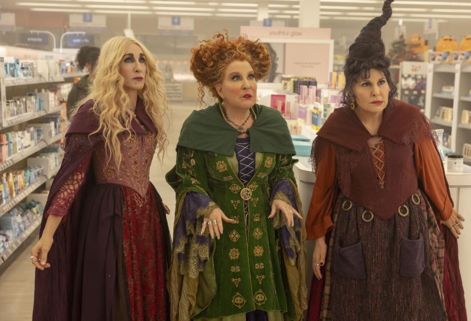 Sarah Jessica Parker as Sarah Sanderson (left), Bette Midler as Winifred Sanderson and Kathy Najimy as Mary Sanderson in Disney+'s "Hocus Pocus 2."