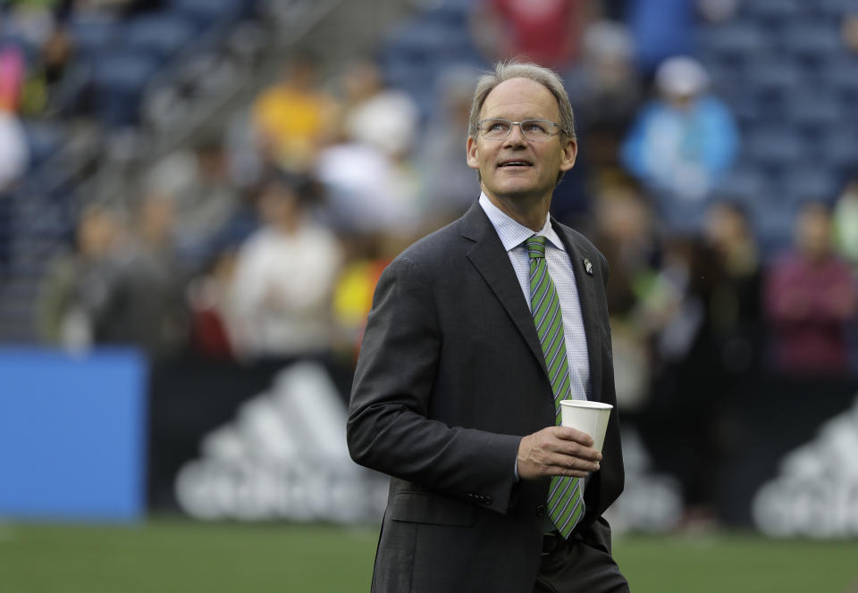 FILE - In this July 17, 2019, file photo, Seattle Sounders head coach Brian Schmetzer walks on the pitch before an international friendly soccer match against Borussia Dortmund in Seattle. The MLS soccer team announced Monday, Jan. 25, 2021, that the team and Schmetzer had reached agreement on a multiyear contract extension. (AP Photo/Ted S. Warren, File)