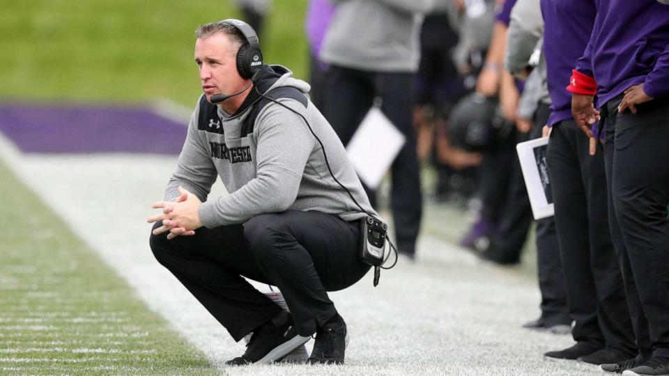 PHOTO: FILE - Northwestern coach Pat Fitzgerald squats on the sideline in the first quarter against Wisconsin at Ryan Field, Oct. 27, 2018, in Evanston, Illinois. (John J. Kim/Chicago Tribune/Tribune News Service via Getty Images, FILE)