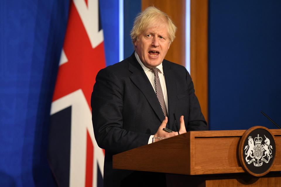 Britain's Prime Minister Boris Johnson gives an update on relaxing restrictions imposed on the country during the coronavirus covid-19 pandemic at a virtual press conference inside the Downing Street Briefing Room in central London on July 5, 2021. - Prime Minister Boris Johnson will on Monday unveil a plan to lift most if not all of England's pandemic restrictions from July 19, as he urged the public to 