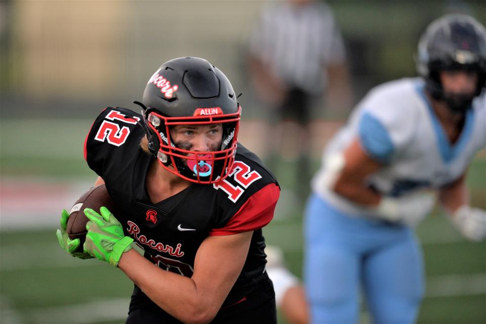 ROCORI's Adam Langer looks up the field after making the catch against Becker in the season opener on Friday, Aug. 26, 2022, at ROCORI High School.