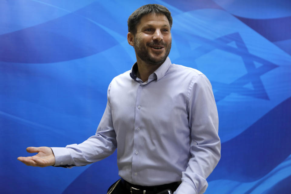 FILE - In this June 24, 2019, file photo, Bezalel Smotrich, the then Israeli transportation minister, arrives to attend a weekly cabinet meeting in Jerusalem. An alliance of far-right groups including openly racist and homophobic candidates like Smotrich appears poised to enter Israel’s parliament, possibly as an indispensable member of Prime Minister Benjamin Netanyahu’s right-wing coalition, according to exit polls Tuesday, March 23, 2021. Smotrich, a longtime activist, has organized anti-gay protests and recently compared gay marriage to incest. (Menahem Kahana/Pool via AP, File)