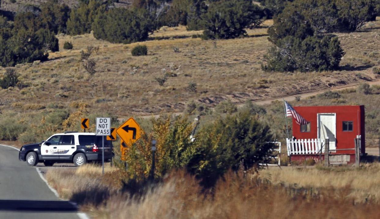 The Santa Fe County Sheriff's Officers respond to the scene of a fatal accidental shooting at a Bonanza Creek Ranch movie set near Santa Fe, N.M. Thursday, Oct. 21, 2021.