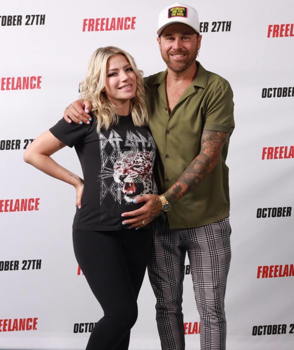 Expecting mom and WWE Superstar Alexa Bliss with Ryan Cabrera before a screening of the John Cena movie “Freelance” at Regal Cinemas in the Waterford Lakes Plaza in Orlando, near the University of Central Florida. The action comedy opens Oct. 27. Photo By Harry Aaron/Courtesy RMG