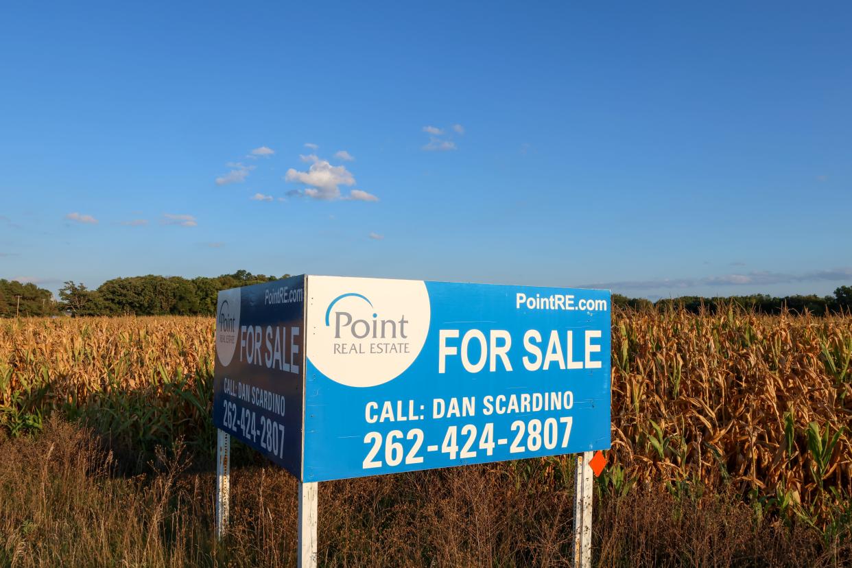 The sign by Point Real Estate points to a major development that is advancing through the planning stages for the southeast quadrant of highways 18 and 67 in the village of Dousman. If fully built as conceived in conceptual documents, the 145-acre parcel would include single-family homes, condos, apartments and commercial buildings.