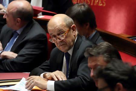 FILE PHOTO: French Foreign Affairs Minister Jean-Yves Le Drian attends the questions to the government session at the National Assembly in Paris, France, February 20, 2018. REUTERS/Gonzalo Fuentes