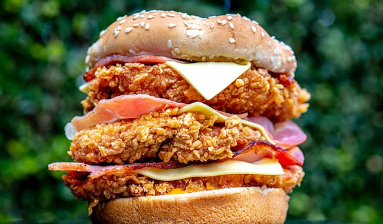 KFC Australia introduce the Triple Stacker chicken burger available through secret menu on KFC app