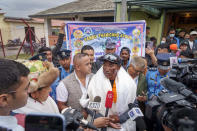 Veteran Sherpa guide Kami Rita talks to the media as he arrives at the airport in Kathmandu, Nepal, Thursday, May 25, 2023. The 53-year-old guide scaled Mount Everest for the 28th time on Tuesday beating his own record within a week as two guides compete with each other for the title of most climbs of the world's highest peak. (AP Photo/Niranjan Shrestha)