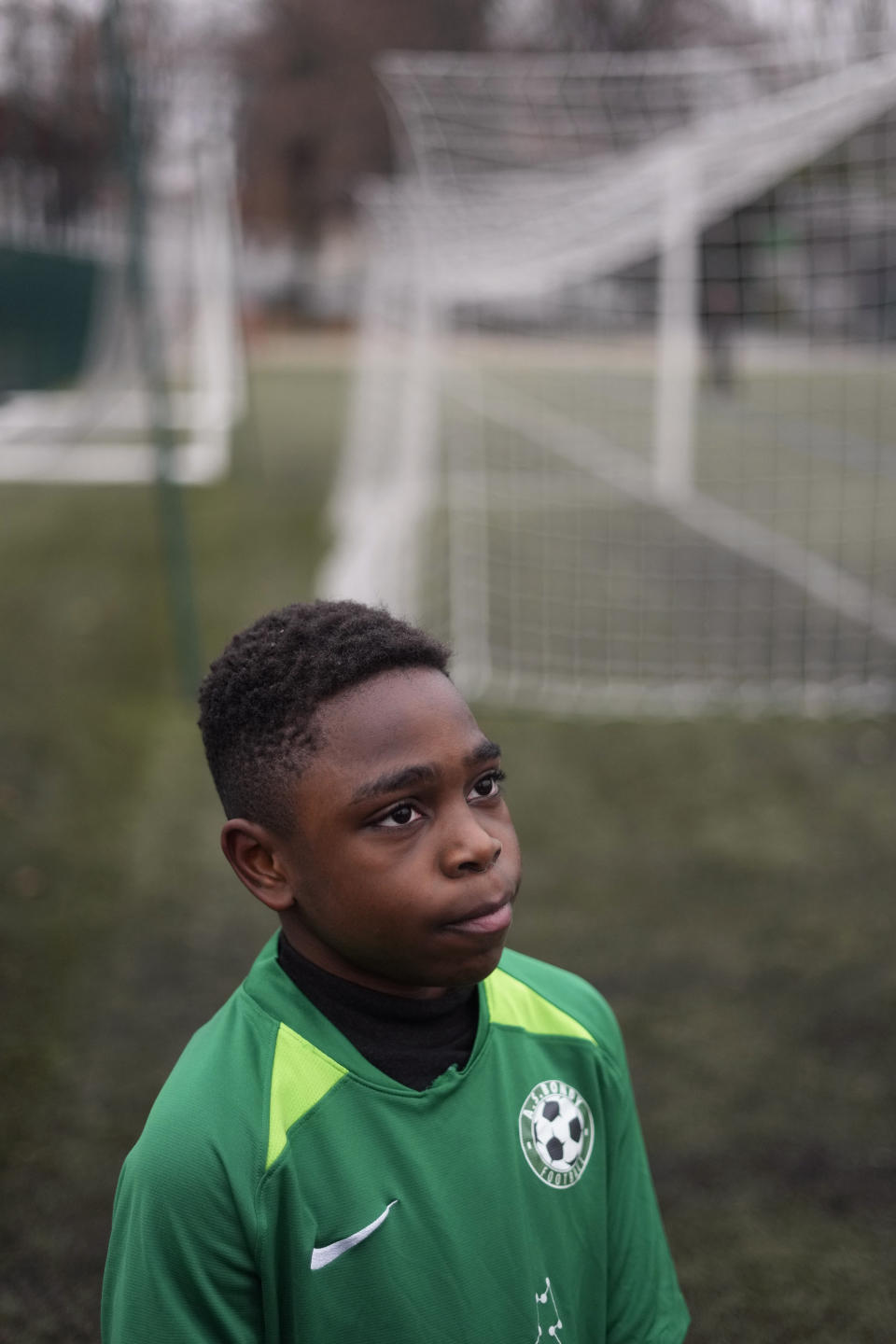 Player of the football club AS Bondy, where Kylian Mbappe played as a kid, Yacine Ngamatah, stands on the pitch after a match on the Leo Lagrange stadium in Bondy, east of Paris, Saturday, Dec. 17, 2022. On the football fields where Kylian Mbappe hones the feints, dribbles and shots that all of France hopes to see in Sunday's World Cup final against Argentine, the next generation of French kids with big dreams is already hard at work to follow in the superstar's footsteps. (AP Photo/Thibault Camus)