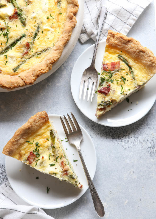 <strong>Get the <a href="https://www.completelydelicious.com/asparagus-and-bacon-quiche-with-cream-cheese/" target="_blank">Asparagus, Bacon and Cream Cheese Quiche</a> recipe from Completely Delicious</strong>