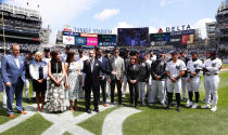 New York Yankees broadcaster John Sterling acknowledges fans during his retirement ceremony before a baseball game against the Tampa Bay Rays at Yankee Stadium in New York, Saturday, April 20, 2024. (AP Photo/Noah K. Murray)