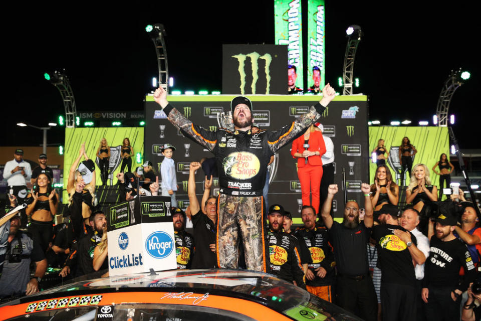 Martin Truex Jr. celebrates winning the 2017 Cup Series championship. (Getty)