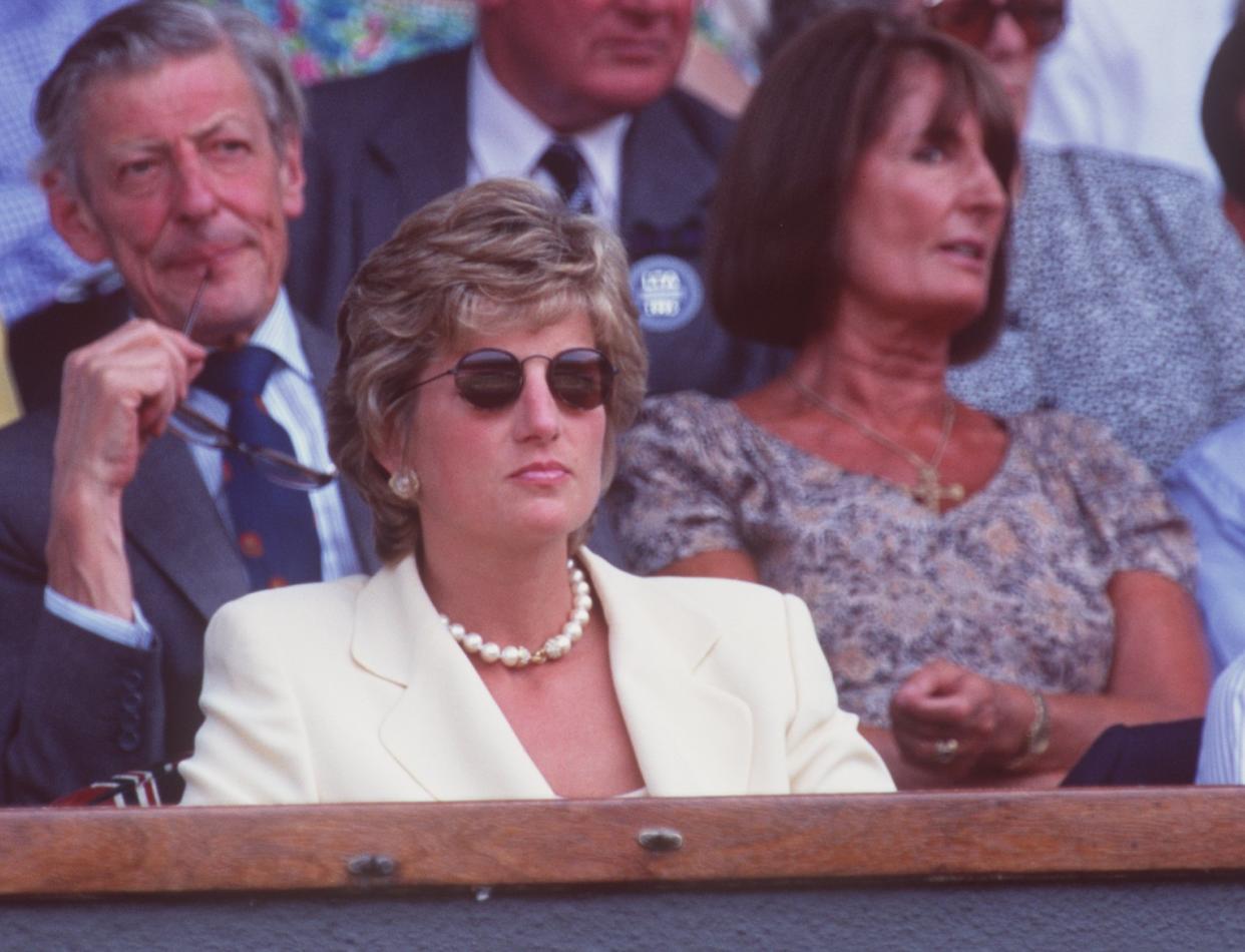 9 JUL 1995:  DIANA, PRINCESS OF WALES, WATCHES FROM THE CROWD AS BORIS BECKER LOSES TO PETE SAMPRAS OF THE USA IN THE MENS SINGLES FINAL AT THE WIMBLEDON LAWN TENNIS CHAMPIONSHIPS.  SAMPRAS WON THE MATCH IN FOUR SETS 6-7 (2-7), 6-2, 6-4, 6-2 TO TAKE THETITLE. Mandatory Credit: Clive Brunskill/ALLSPORT