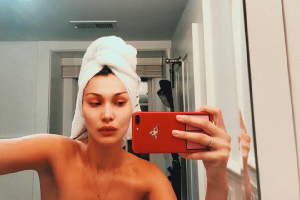 <p>The supermodel shared this revealing selfie after she had just stepped out of the shower, wearing just a towel around her head.</p>