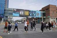 The Texas basketball walks to Victory Field, Wednesday, March 17, 2021, in Indianapolis. (AP Photo/Darron Cummings)