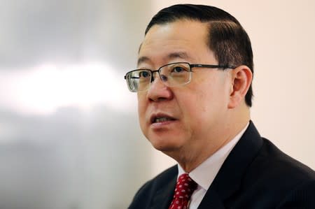 Malaysia's Finance Minister Lim Guan Eng speaks during an interview with Reuters in Putrajaya