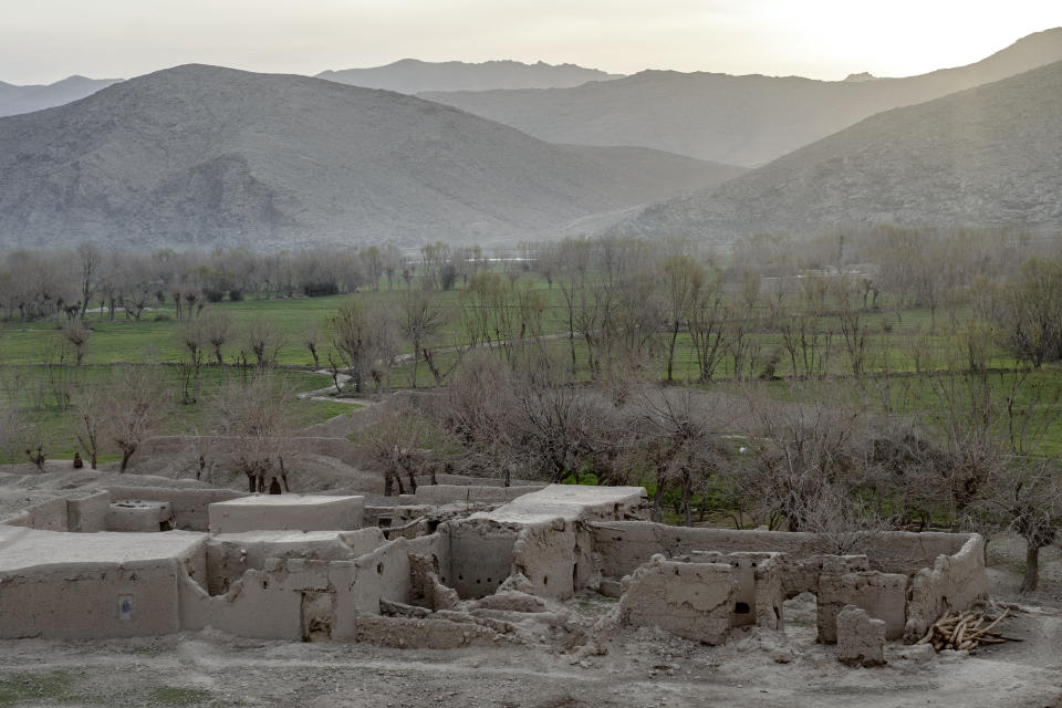 The remains of a home destroyed by U.S. forces during a Sept. 5, 2019, night raid is seen in a village in a remote region of Afghanistan, on Saturday, Feb. 25, 2023. Survivors and villagers who pulled bodies from the rubble said that more than 20 people were killed. Among them were a local farmer, his wife and five of their children. The villagers said that after the raid, they also found four more of the farmer’s children _ three girls and a boy _ covered in dirt, crying amid flames and ruins. (AP Photo/Ebrahim Noroozi)