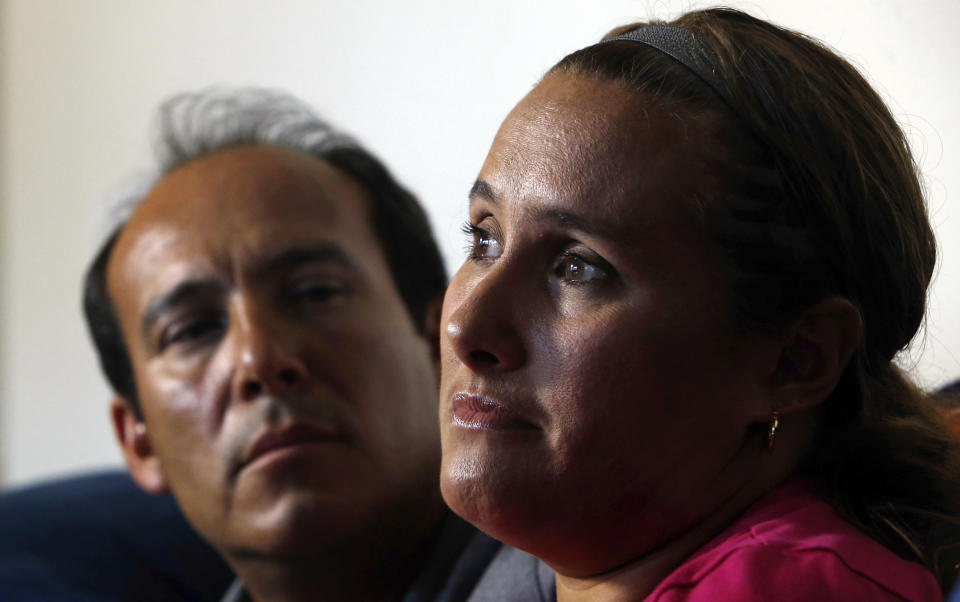 In this April 17, 2015 photo, Sergio and Becky Celis, parents of Isabel Celis, talk about their daughter's disappearance on April 20, 2012, during an interview in Tucson, Ariz. Her father reported her missing the next morning after finding she was not in her bedroom. Tucson Police Chief Chris Magnus said Friday, March 31, 2017, that police found the remains of Isabel Celis in a rural area of Pima County about a month ago "not by happenstance." (Kelly Presnell/Arizona Daily Star via AP)