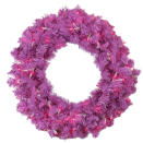 This undated photo shows Lowes' pink artificial wreath, which puts a pop of playful holiday color on the front door or mantel. In keeping with the trend towards 70s and 80s home décor, consider dressing up the home with some sparkle and color that evokes the festive party aspect of those eras. (Lowe's Home Improvement via AP)