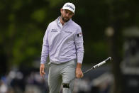 Cameron Young reacts after missing a putt on the eighth hole during the final round of the PGA Championship golf tournament at Southern Hills Country Club, Sunday, May 22, 2022, in Tulsa, Okla. (AP Photo/Sue Ogrocki)