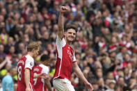 Arsenal's Declan Rice celebrates after scoring his side's third goal during the English Premier League soccer match between Arsenal and Bournemouth at Emirates Stadium in London, England, Saturday, May 4, 2024. (AP Photo/Frank Augstein)